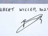 a drawing of a man holding a surfboard on a piece of paper