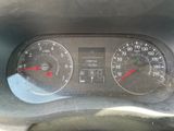a close up of a car dashboard with a speedometer and gauges