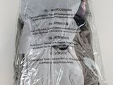 a plastic bag with a bunch of items inside of it