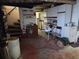 an image of a room with a lot of stuff on the floor