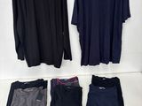 men ' s long sleeved t - shirts and pants on a hanger