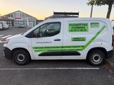 a van that is parked in a parking lot
