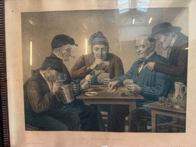a picture of a group of men sitting around a table