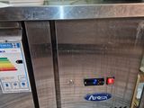 a stainless steel counter top in a commercial kitchen