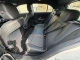 the back seats of a car are empty in the back of the car