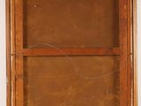 an old wooden window with a glass pane in it