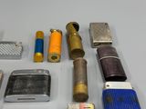 many different types of lighters and lighters laid out on a table