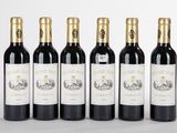 six bouteilles de vin rouge alignées