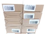 several boxes are stacked on top of each other on a white surface