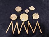 a group of gold coins sitting on top of a black table
