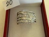an image of a diamond ring in a red box with a price tag