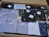 a cardboard box filled with a lot of different items