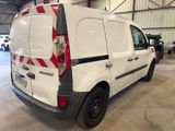 a white van that is parked in a garage