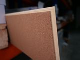a close up of a piece of wood with a piece of wood sticking out of it