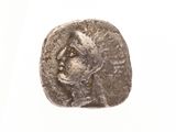 l'image d'une pièce d'argent représentant le visage d'une femme