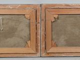 pair of antique wooden picture frames with glass inserts