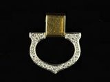 a close up of a gold and diamond ring on a black background