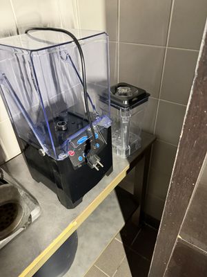 a blender that is sitting on a counter in a kitchen