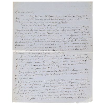 une lettre écrite à l'encre noire sur une feuille de papier