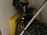 a bike leaning against a wall next to a radiator