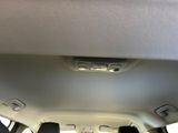 a view of the back of a car from the passenger ' s seat