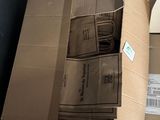 many boxes of food sitting on the floor next to each other