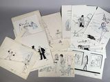 beaucoup de dessins représentant des personnes posés sur une table
