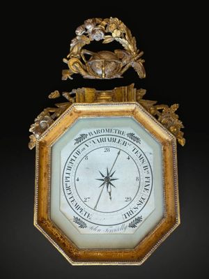 Baromètre en bois stuqué et doré de forme octogonale selon T…