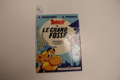 une image représentant une illustration tirée d'un album de bande dessinée accrochée au mur