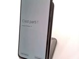 the back of a black samsung s9 phone with a display on it
