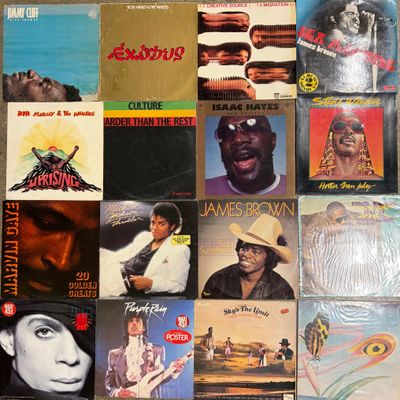 a lot of records that are on the table