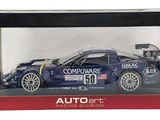 the box is open to show a model of a race car