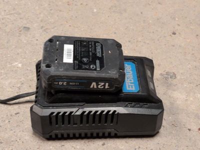 two batteries on top of each other on the ground
