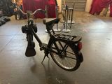 a bicycle that is parked in a room