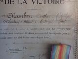 a very old certificate with a ribbon on it