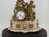 a clock that is sitting on top of a table