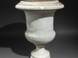 an image of a white vase sitting on top of a table