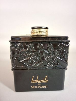 an image of a black box with a gold ring on top of it
