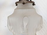 a light that is hanging from the ceiling in the room