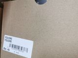 a picture of a box with a label on it