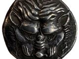 une image d'une pièce de monnaie sur laquelle figure un visage