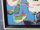 a picture of a painting of flowers in a black frame