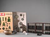 a box with abacuses and a box with other items on it