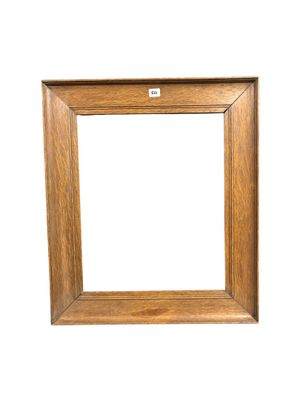 a wooden picture frame on a white background