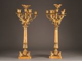 pair of antique brass candelabs with eagle heads