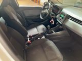 a car that has a steering wheel and a dashboard