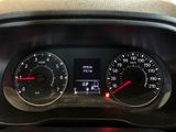 a close up of a car dashboard with a speedometer and gauges