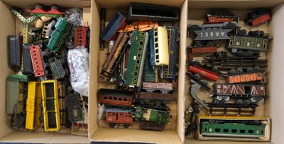 a box full of toy trains sitting on a table