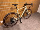 a bike that is leaning against a wall in a room