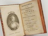 an old book with a picture of a woman on it